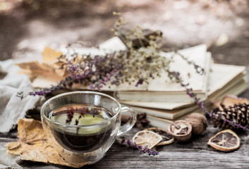 cup of tea with autumn leaves