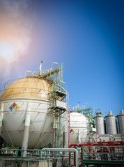 sphere gas storage in petrochemical plant with blue sky