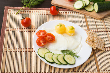 Breakfast. Fried Eggs (with raw frozen yolk) and Vegetables