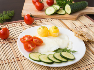 Breakfast. Fried Eggs (with raw frozen yolk) and Vegetables