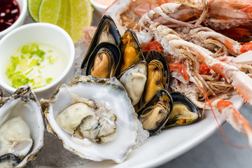 Fresh seafood platter with lobster, mussels and oysters