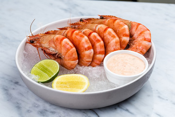Fresh royal prawns with lemon and sauce