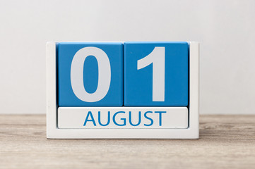 August 1st. Image of august 1, close-up wooden color calendar on white background. Summer day