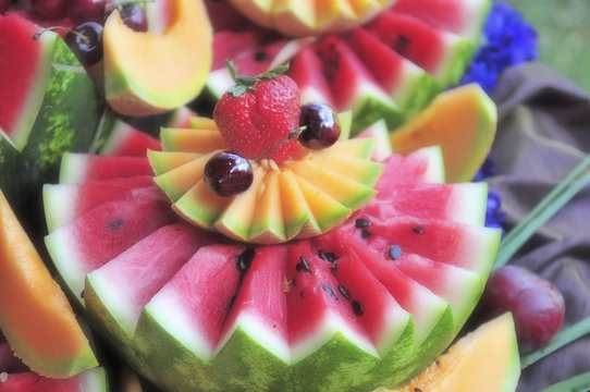 Water melon and fruit decoration on a buffet.