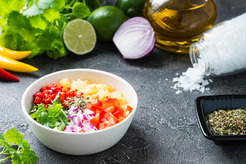 Not mixed pineapple salsa with chili, onion, mint