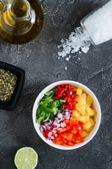 Not mixed pineapple salsa with chili, onion, mint. Top view
