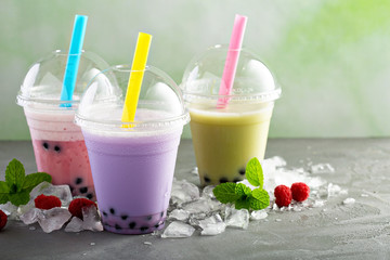 Variety of bubble tea in plastic cups