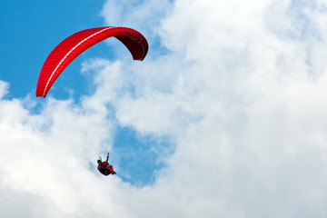 Paraglider up in the sky