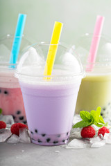 Variety of bubble tea in plastic cups