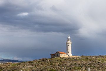 Fototapeta na wymiar Lighthouse in Paphos, Cyprus, on the shores of the Mediterranean Sea