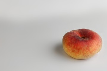 ripe peach fruits on white background