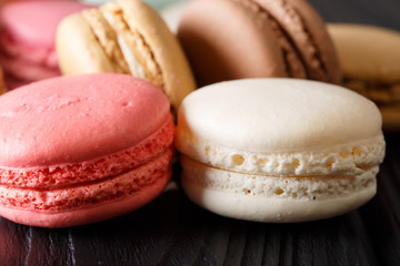 Texture of white and pink macaroons macro. horizontal