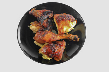 Grilled chicken with vegetables on plate