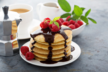 Stack of fluffy buttermilk pancakes with chocolate