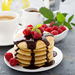 Stack of fluffy buttermilk pancakes with chocolate