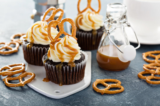 Salted caramel cupcakes with pretzels - Powered by Adobe