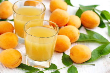 Apricot juice and ripe fresh apricots