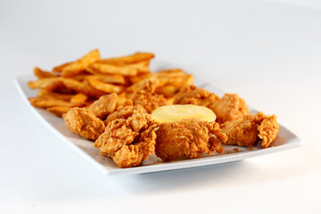 chicken fingers w/ fries and sauce