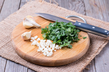 Garlic and parsley on the board