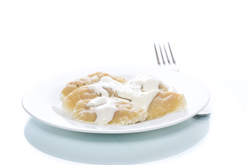 Dumplings stuffed with sour cream boiled