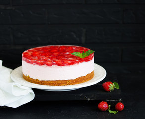 Cake with strawberries and cream. Selective focus.