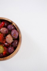 Cropped image of olives with chili pepper