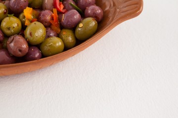 Cropped image of olives served in container