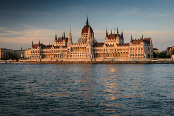 Fototapeta na wymiar Budapest parliament at sunset near the Danube river