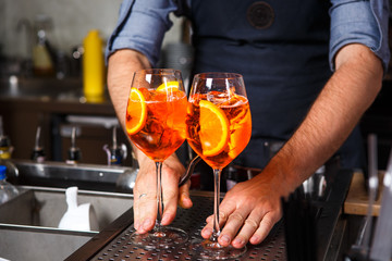 Barman at work, preparing cocktails. concept about service and beverages In the kitchen in the restaurant