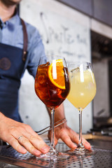 Barman at work, preparing cocktails. concept about service and beverages In the kitchen the restaurant