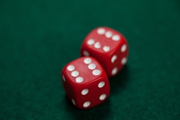 Pair of dice on poker table