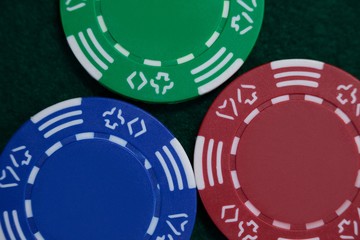 Casino chips arranged on poker table