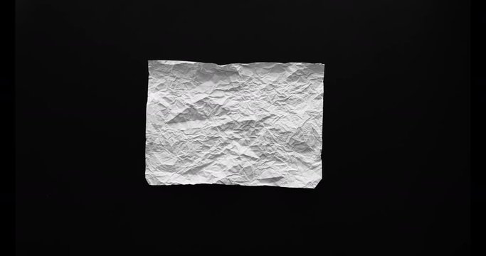 Paper crumple stop motion.