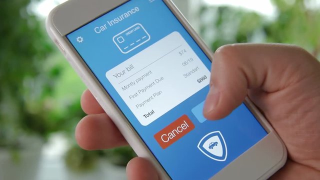 Paying for car insurance bill using smartphone application