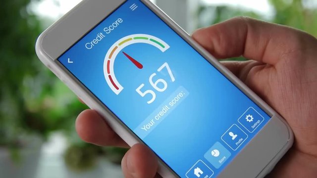 Checking credit score on smartphone using application. The result is AVERAGE