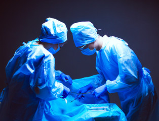 Team surgeon at work in operating room