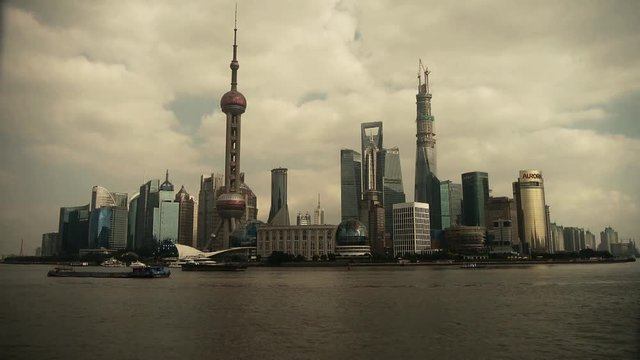Shanghai Lujiazui business economic Center,urban building & busy shipping.