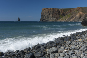Rocky cliffs and a stony beach at the Atlantic coast © Pawel Sidlo