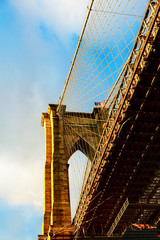 Brooklyn bridge with cloudy blue sky, New York