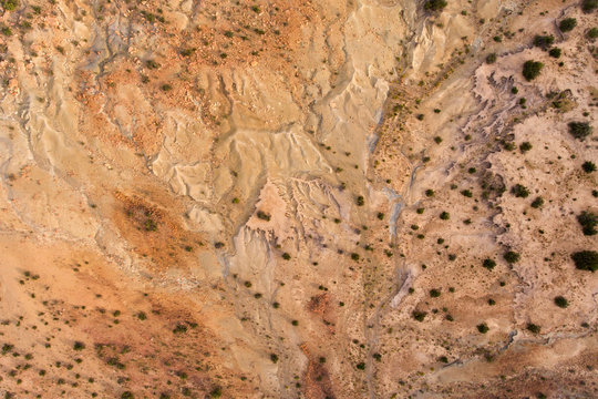 Aerial view of severe soil erosion in an arid region of South Africa.