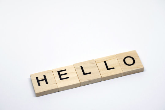 "HELLO" Wooden letters on white background