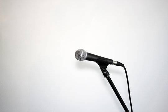 Microphone on stand  white background with copy space stock, photo, photograph, image, picture,