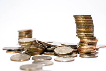 Castle of coin stack isolated on white background