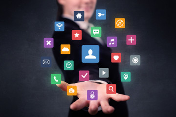 Woman holding colorful applications