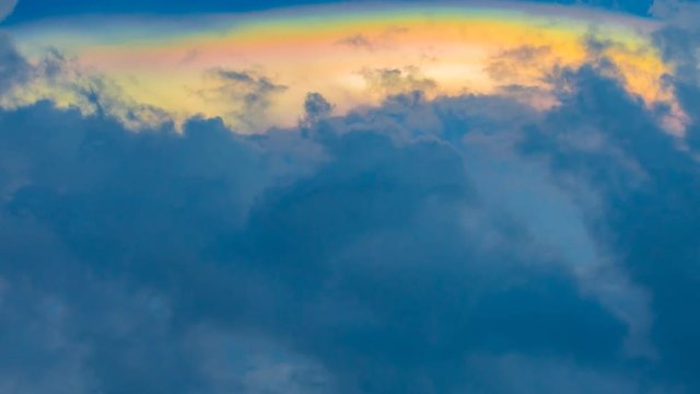 The rainbow clouds are beautifully moving, amazing phenomenon,Time lapse