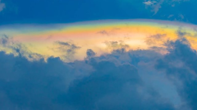 The rainbow clouds are beautifully moving, amazing phenomenon,Time lapse