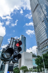 Skyscrapers from a low angle view with traffic lights in Shanghai,China.