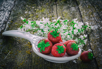 Still life with red strawberries