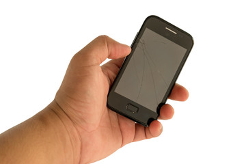 Hand holding a mobile with broken screen.