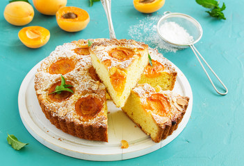 Biscuit cake with apricots and almonds.